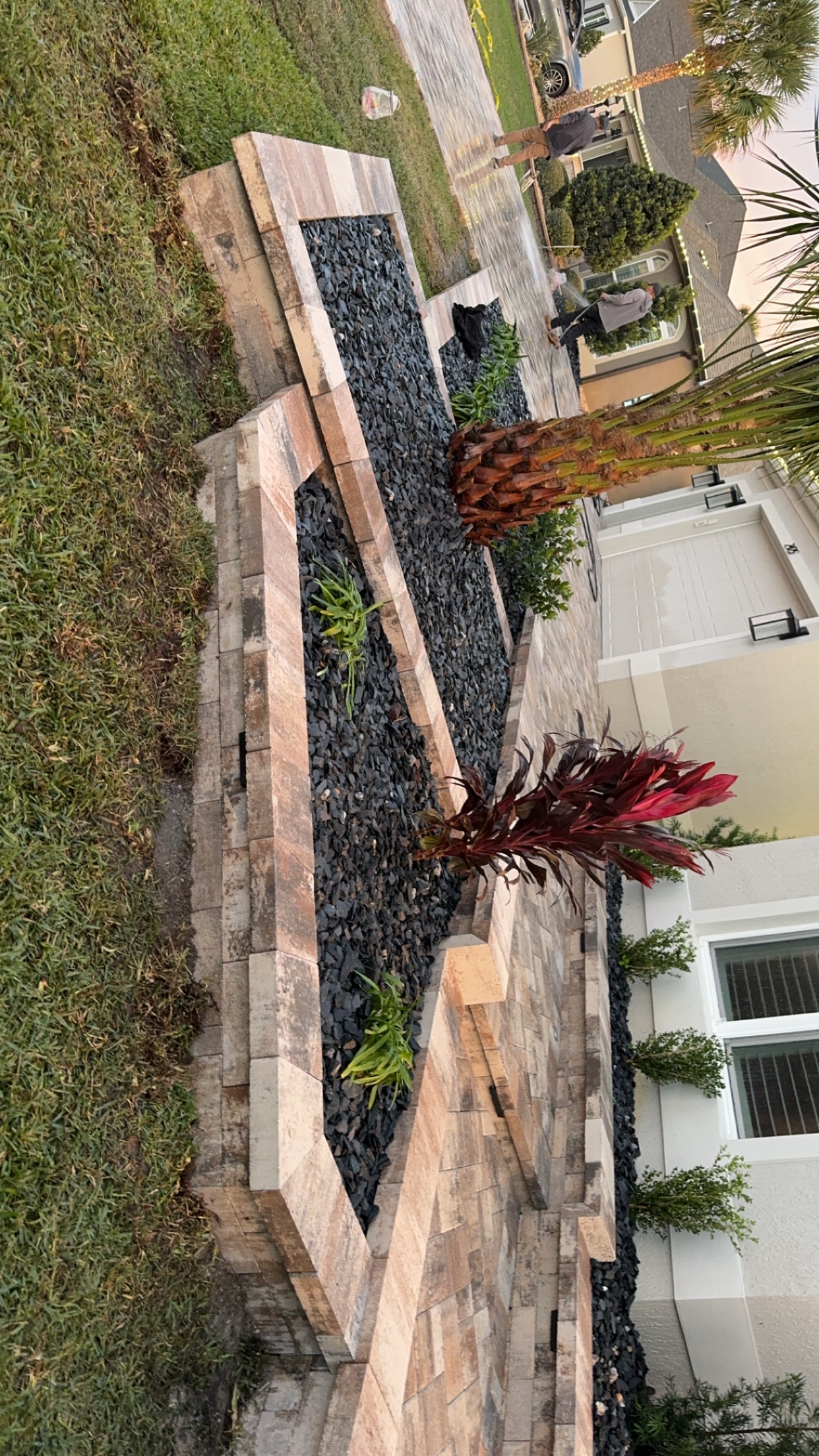 New concrete backyard patio finished beside the home