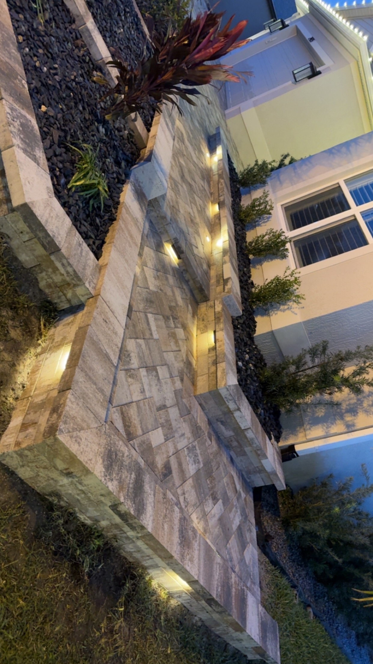Curved paver walkway with concrete edge restraint
